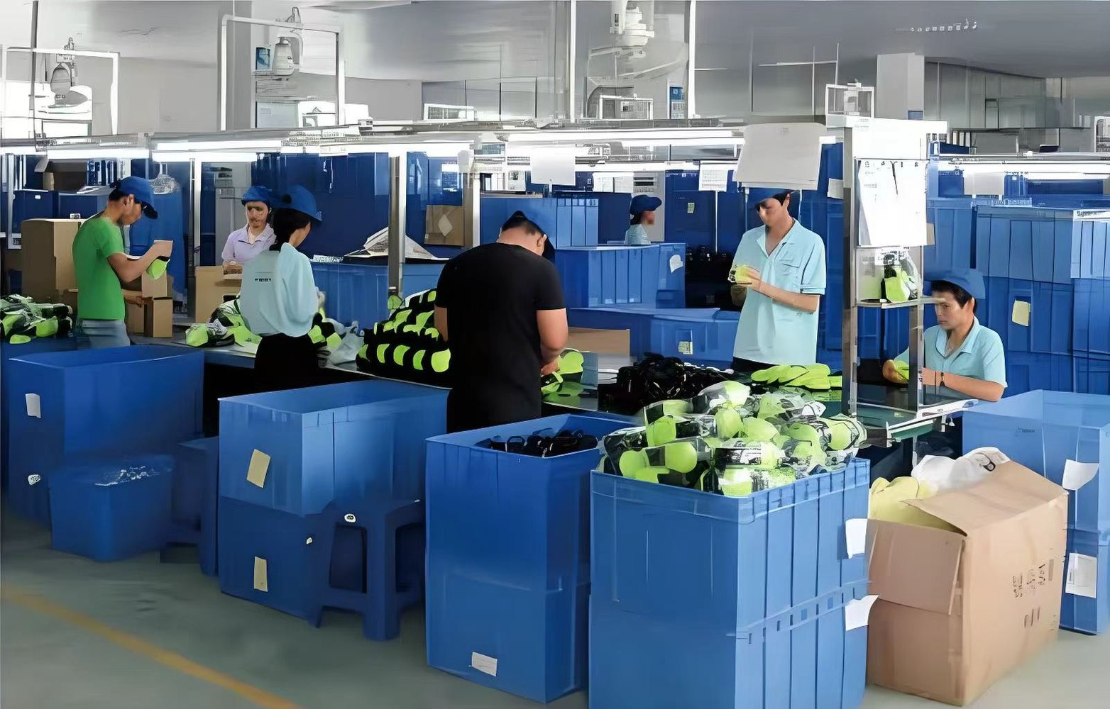 Workers packing PPE products